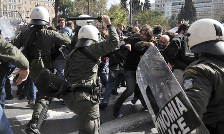 Greek riot police clash with