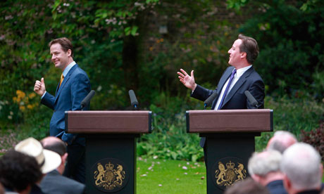 David Cameron and Nick Clegg hold a press conference in the garden of 10 