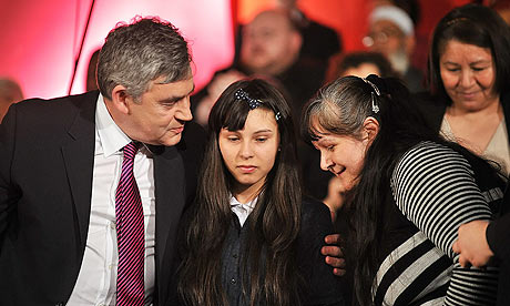 Gordon Brown hugs 14-year-old Tiara Sanchez, who broke down in tears during the Citizens UK event.