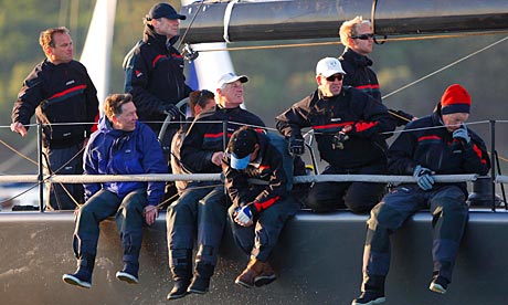Crew aboard the yacht belonging to BP chief executive Tony Hayward (standing, in black cap)