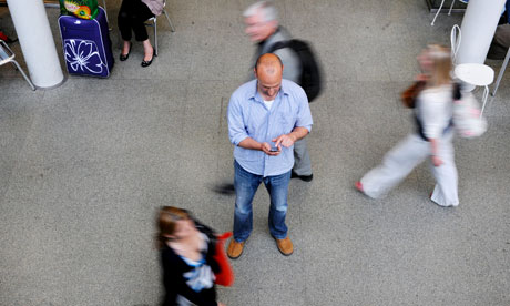 Leo Hickman using an app at Kings Cross station