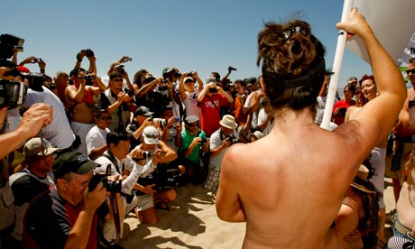 men sported bikini tops