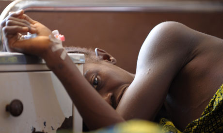 A woman waits for treatment in the mater