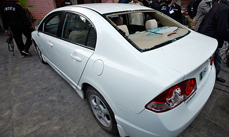 The car a US consulate employee was travelling in when he was engaged in a shoot-out in Lahore.