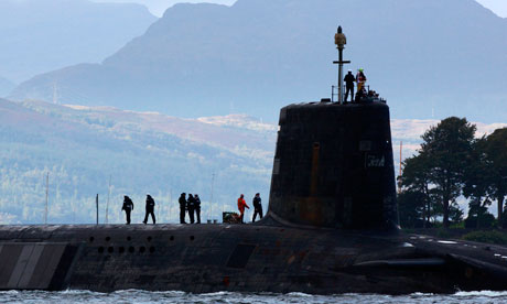 A Vanguard class nuclear submarine, carrying Trident missiles, leaving Faslane