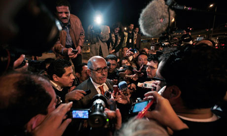 Mohamed ElBaradei gives an impromptu press conference at Cairo airport