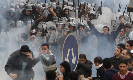 Anti-government protestors clash with riot police in Cairo
