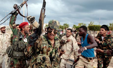 Anti-Gaddafi fighters celebrate Sirte