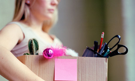 Woman carrying box of stationery
