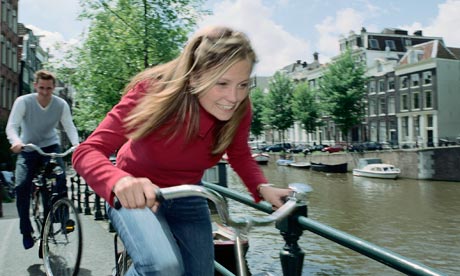 Cycling beside an Amsterdam canal