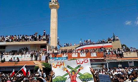 Demonstrators protesting against Syria's President Bashar al-Assad gather in Deraa