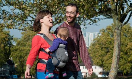 Anna and Paul Garland with son Levin in his carrier.