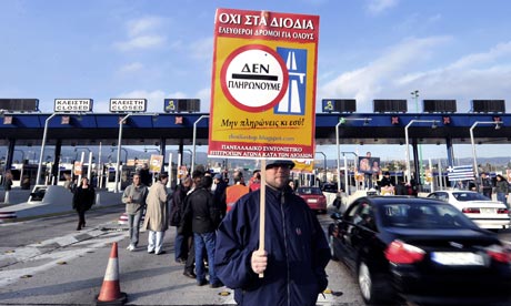 A protester at a toll station outside Athens 