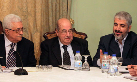 Mahmoud Abbas, Salim al-Zanoun and Khaled Meshaal talk during their meeting in Cairo