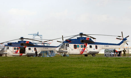 Two civilian helicopters are seen at Malta International Airport
