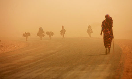 IDPs during a sandstorm outside ZamZam camp in Al Fasher