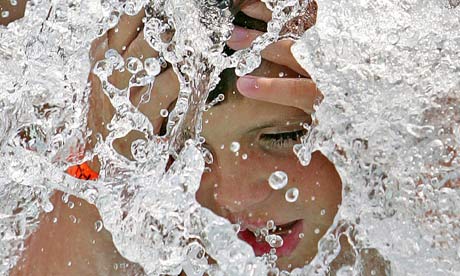 A boy beats the heat wave