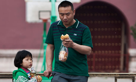A Chinese man and a child in Beijing, China