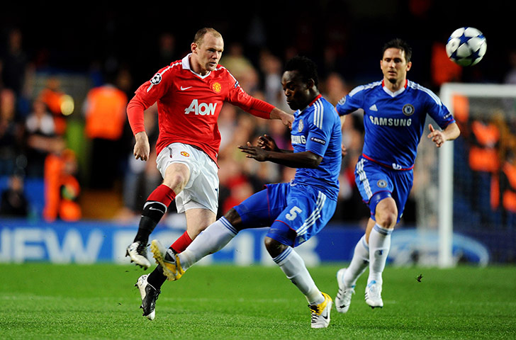 Chelsea v Man Utd: Michael Essien catches Wayne Rooney as they clash in the middle of the park