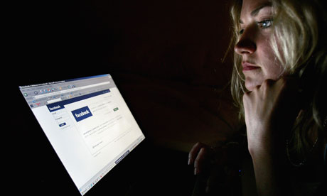 Woman looking at Facebook
