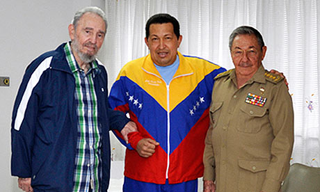 Chávez is visited by Cuba's President Raul Castro (r) and Fidel Castro