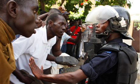 Protestors confront riot police outside the national assembly in Senegal's capital, Dakar. 