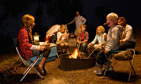 The campfire brings families together, the dinner party drives them apart. Photograph: Darrin Klimek/Getty Images