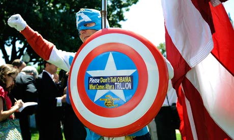 A man dressed as Captain America poses at Tea Party demonstration