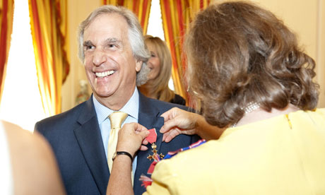 Henry Winkler is presented with an honorary OBE at the British embassy in Washington.