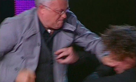 Alexander Lebedev punches Sergei Polonsky during their on-scree argument