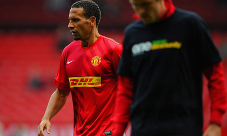 Rio Ferdinand and Wayne Rooney during warm-up