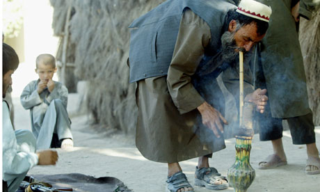 [Image: An-Afghan-farmer-smokes-h-008.jpg]