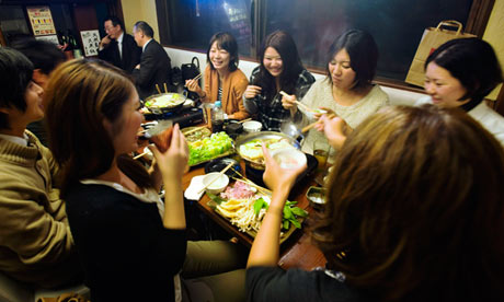 Customers eat Fukushima hotpot at 47 Dining in Tokyo