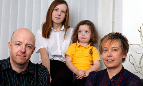 Darren and Karen Millar with two of their children, Tia Gee and Yvie Millar, at home in Mansfield