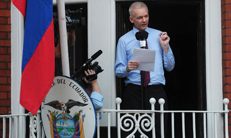  Julian Assange speaks to reporters from the balcony of the Ecuadorian embassy in London