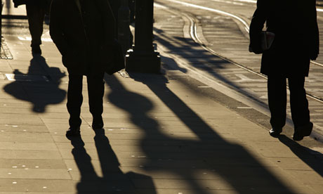 Pedestrians in Manchester. Walking or cycling should be the norm for short journeys, advises Nice