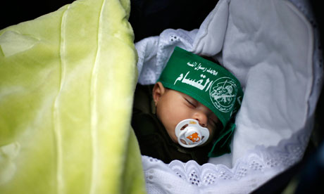 A Palestinian baby wearing a Hamas headband