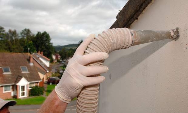 Installing Cavity Wall Insulation in a private house in Bovey Tracey Devon