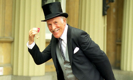 Bruce Forsyth Shows Off His OBE 