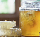 Honeycombs and a jar of honey