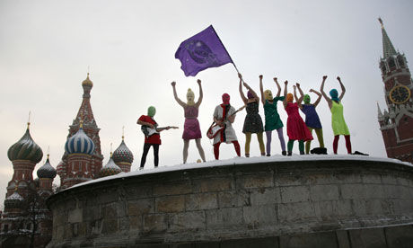 Pussy Riot performing on top of Lobnoye Mesto stone platform on Red Square in Moscow