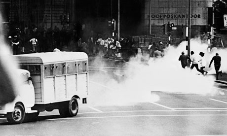 South African police launch teargas at protesters
