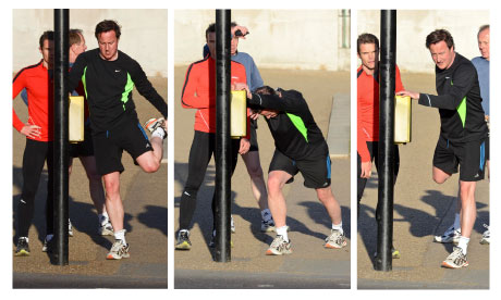 David Cameron jogging with his trainer
