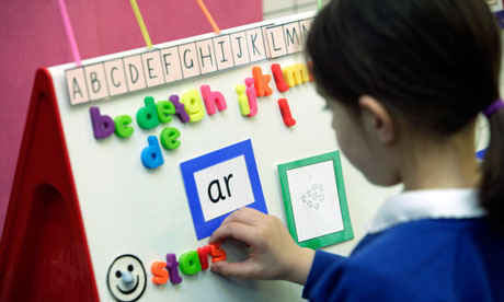 Primary one child learning to read