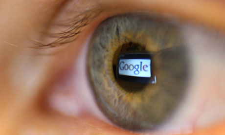 Google logo reflected in a person's eye 