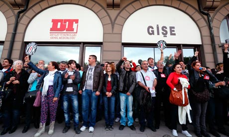 Protesters gather to protest the closing of the National Theater