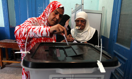Egyptian women cast their votes in the presidential runoff at a polling station in Cairo.