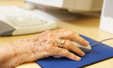 Elderly person using computer