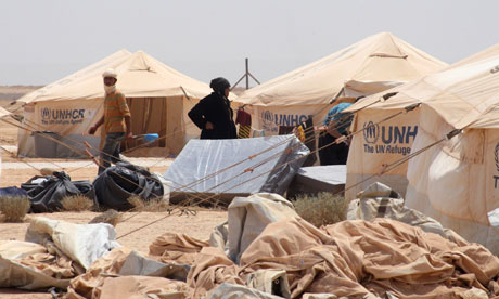 Syrian refugees arrive at the Zaatri refugee camp in Mafraq on the Jordanian-Syrian border