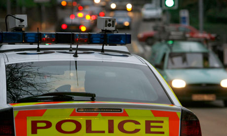 A police car equipped with automatic number plate recognition cameras